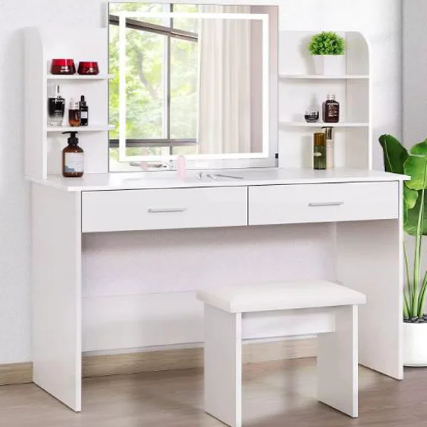 White vanity dressing table with rectangular mirror, drawers, and side shelves