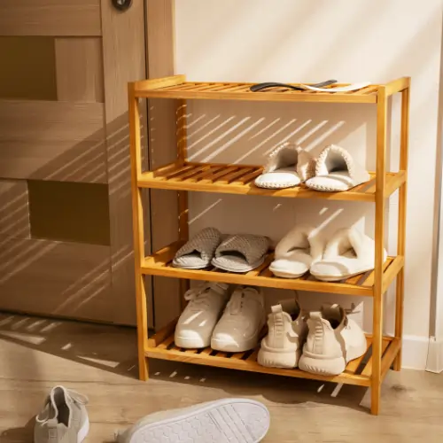 Modern wooden shoe cabinet in Qatar with multi-tier open shelves for organized home footwear storage